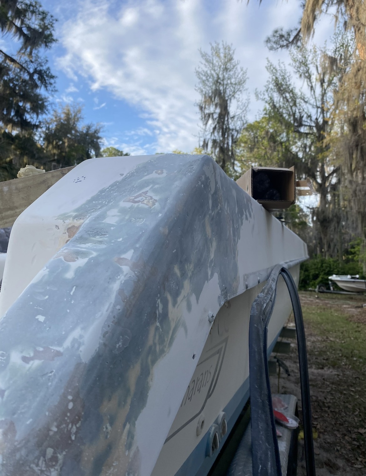 Gel coat repair preparation on boat